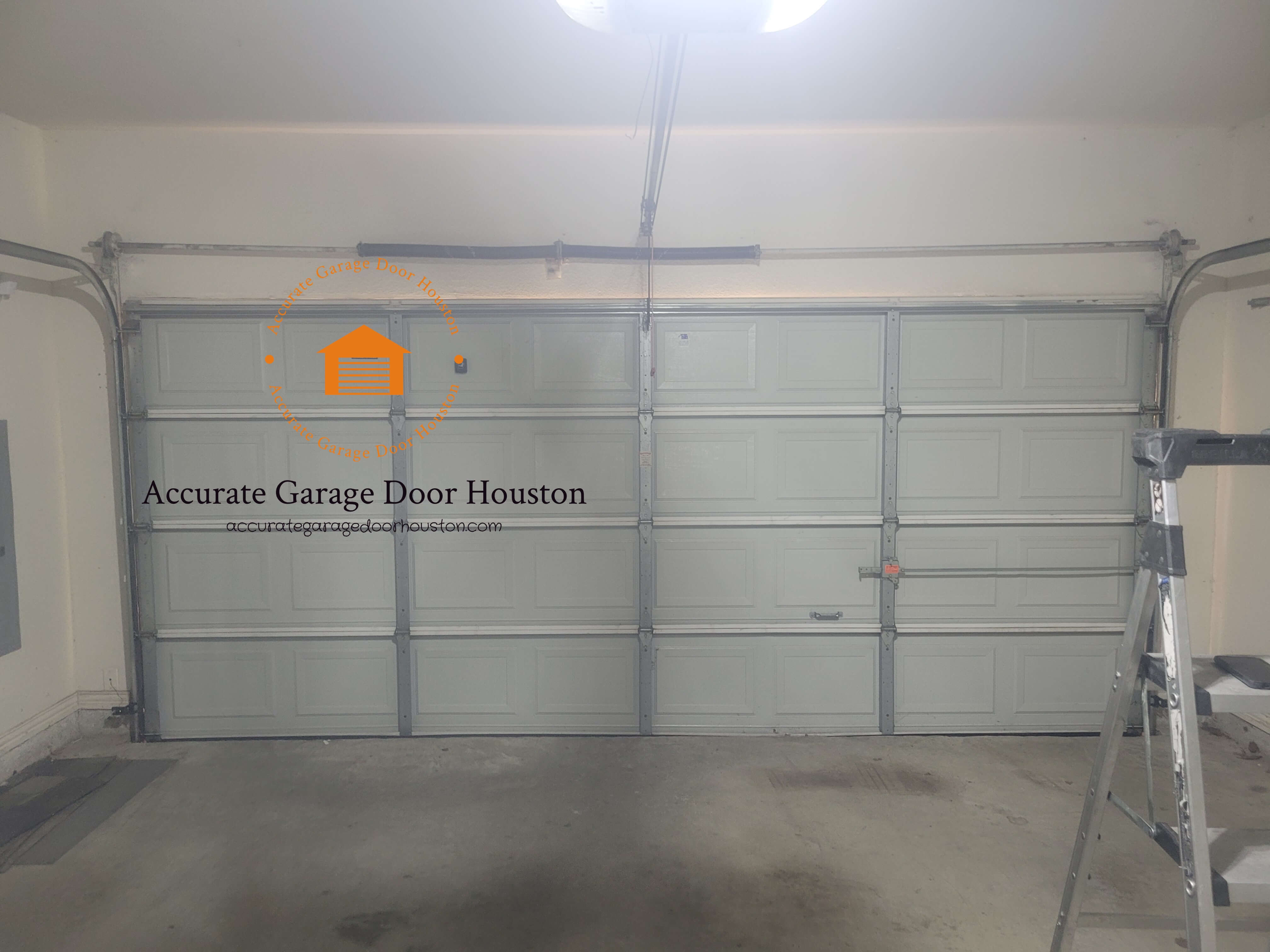 accurategaragedoorhouston.com_new_garage_door_springs_replacements